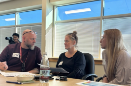 Crisis responders consult with each other during a recent in-person training of the New Hampshire Rapid Response team.